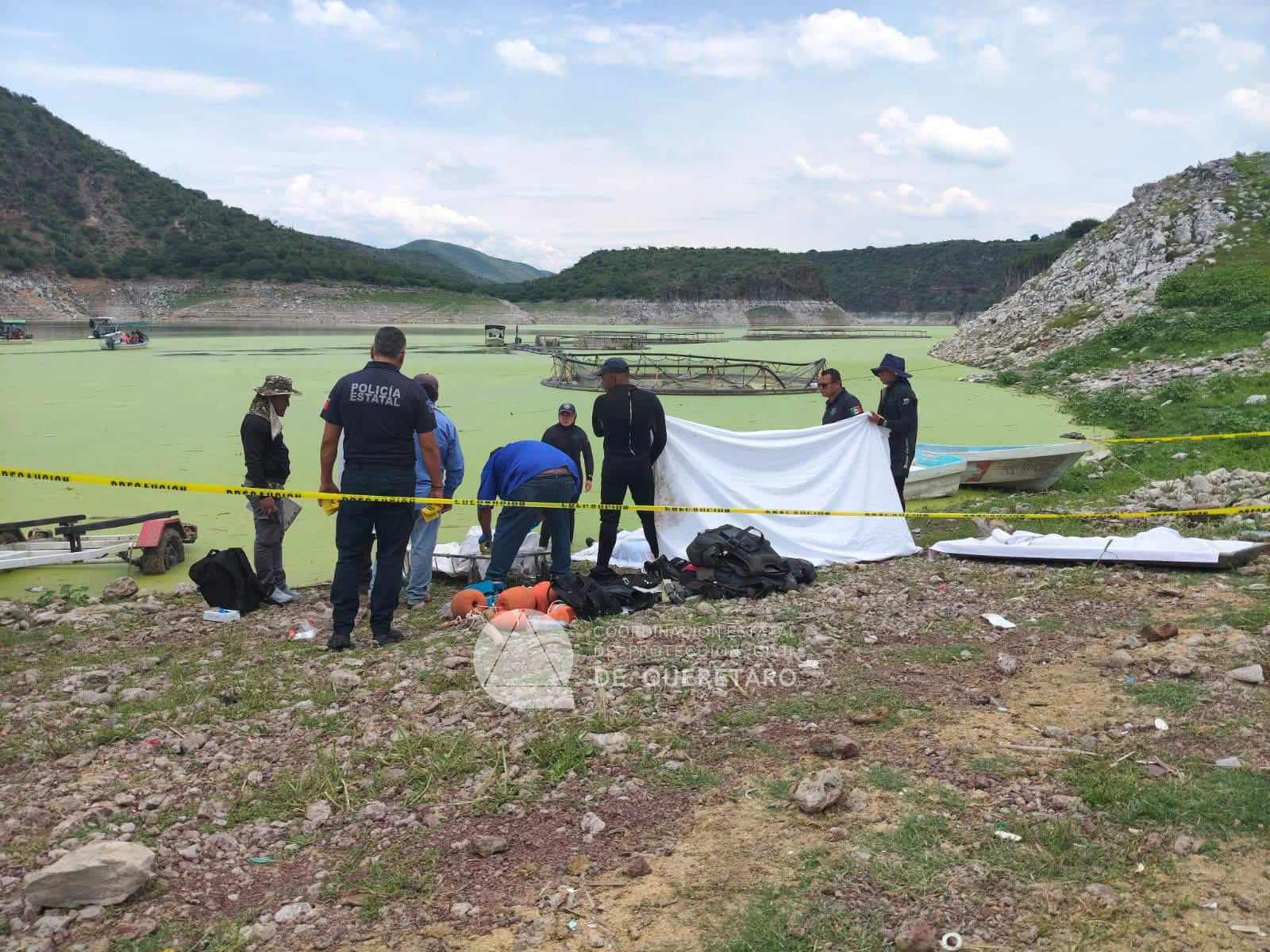 Título Recuperan tres cuerpos en presa de Zimapán